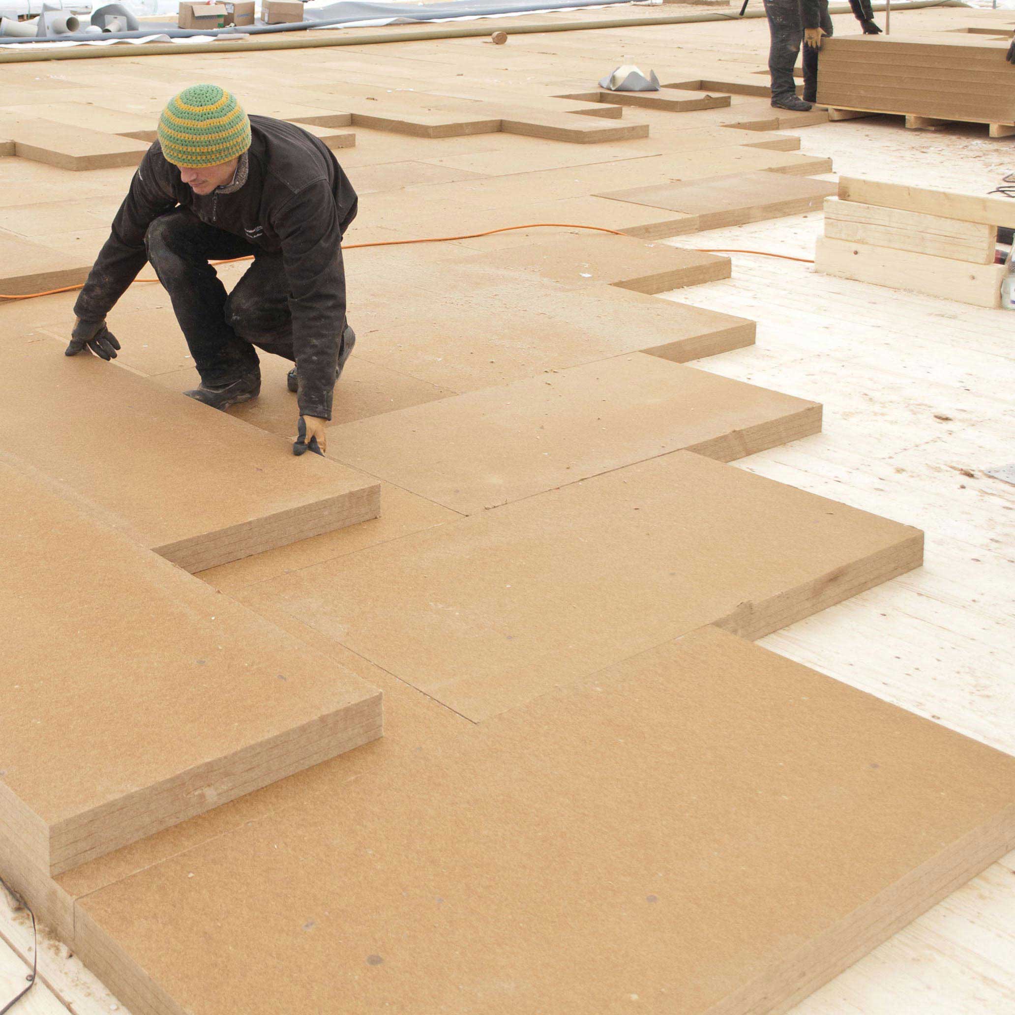 Fiber wood FiberTherm Isorel installation on flat roof